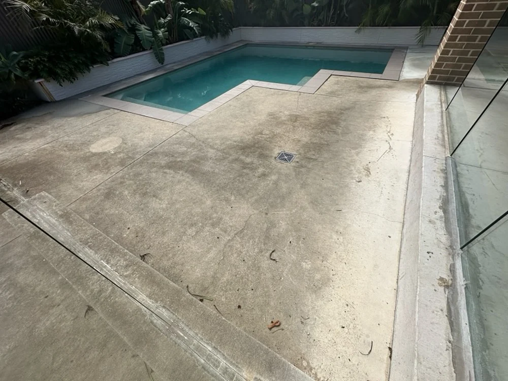 Slippery pool surround before resurfacing